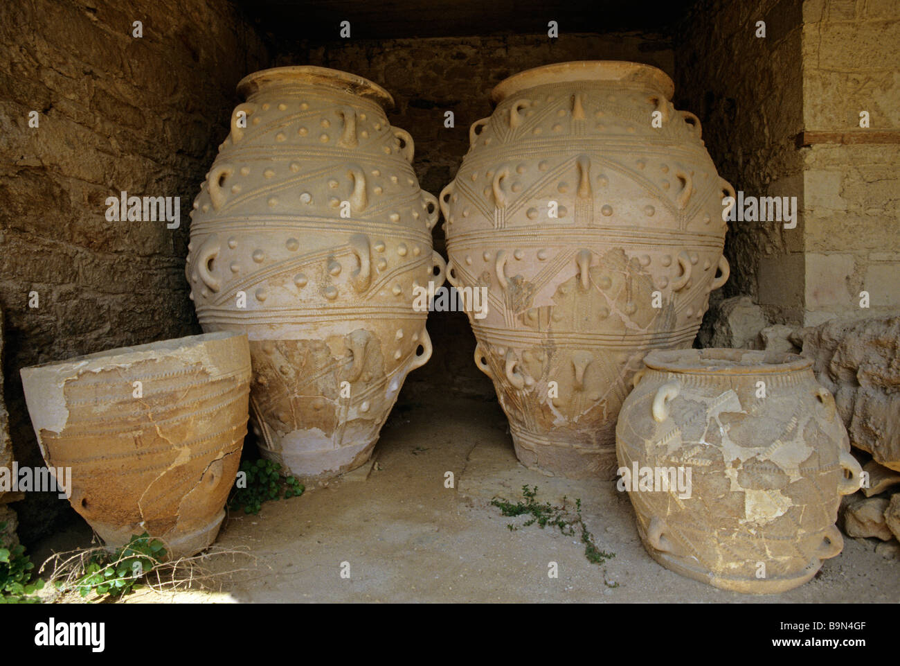 Large decorated clay pots used for storage of oils and grain at the