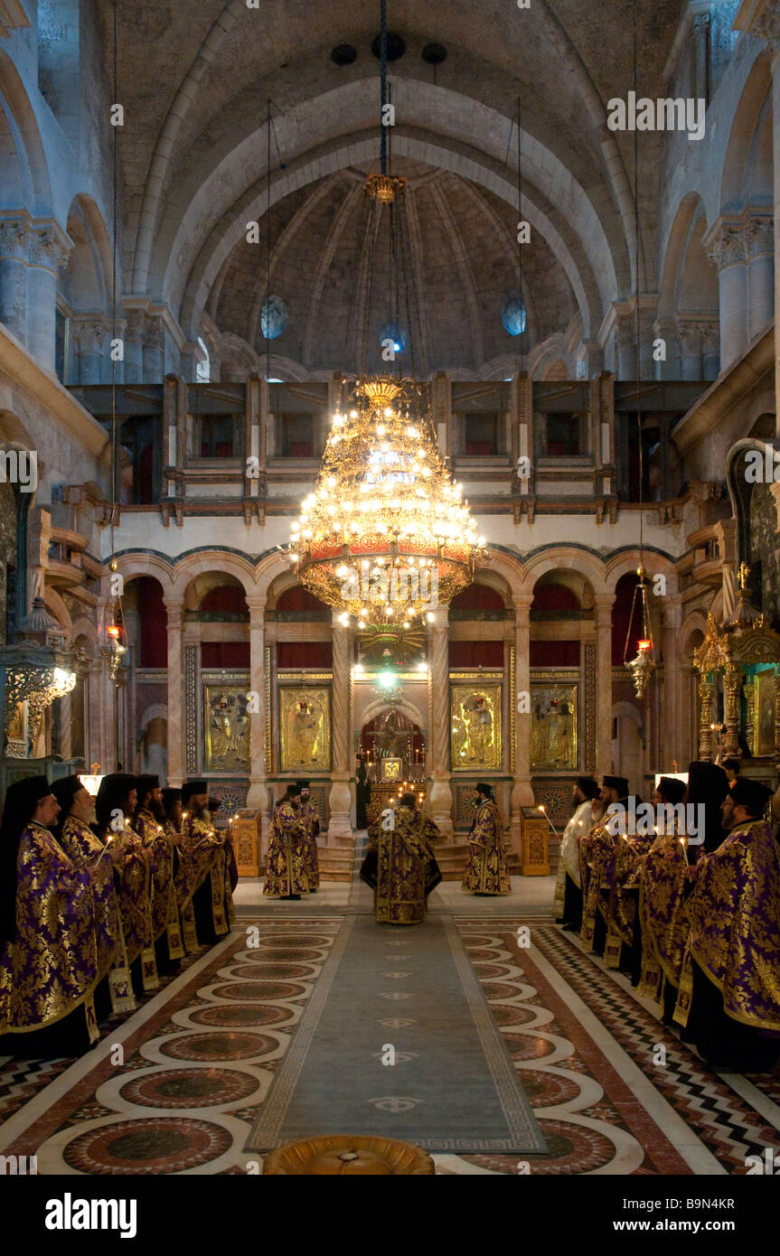 israel Jerusalem Old City church of Holy Sepulchre Orthodox priest standing and singing during lent mass Stock Photo