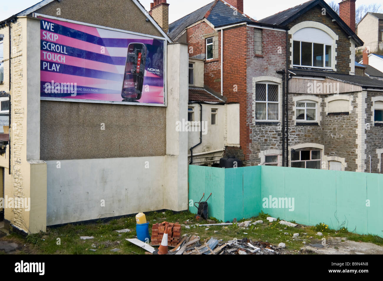 Advertising billboard for Nokia mobile phone on wall of pub building at Crumlin in South Wales Valleys UK Stock Photo