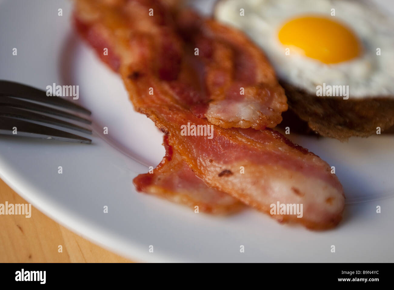 eggs and bacon on a plate for breakfast Stock Photo