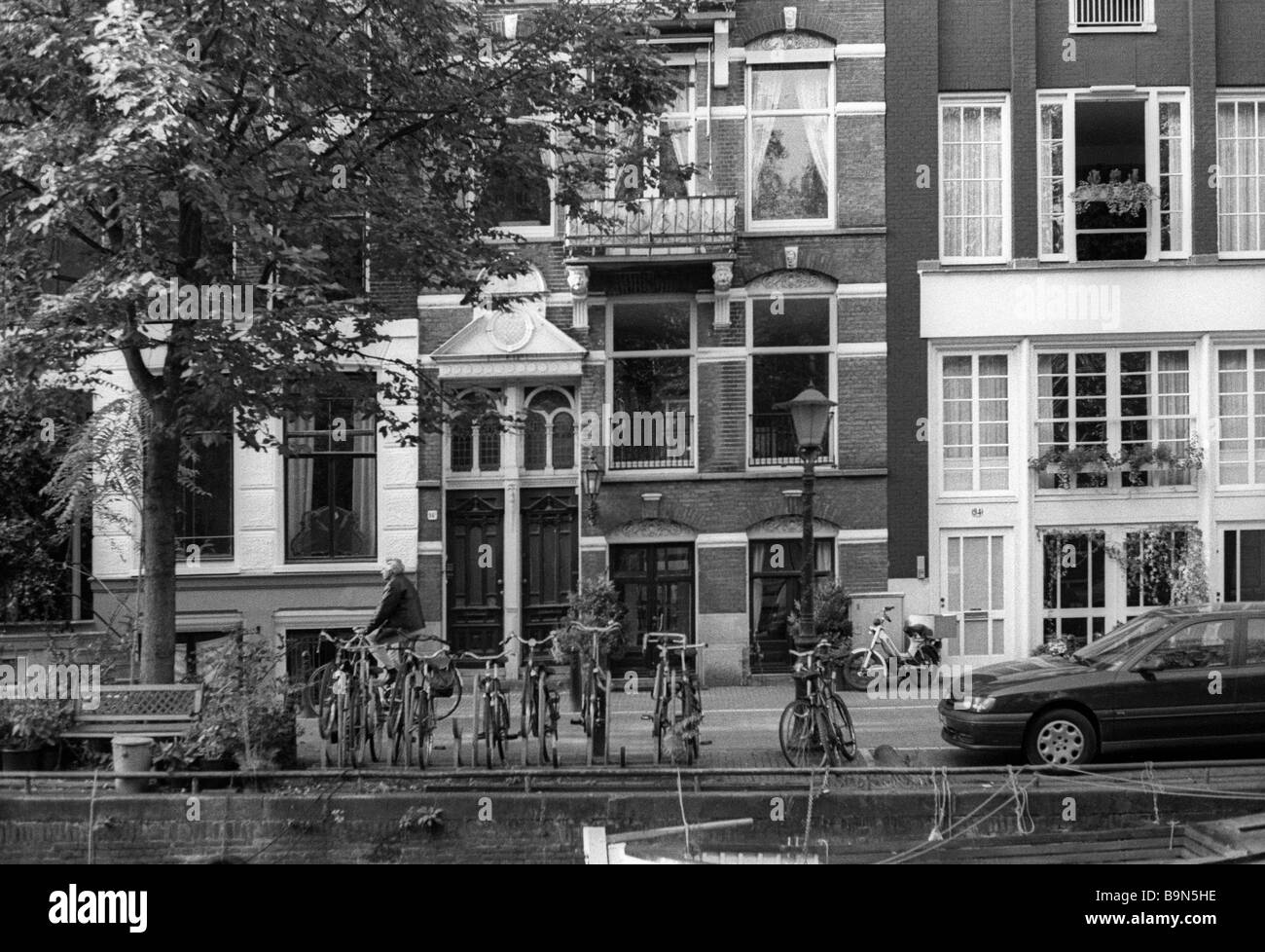 Canalside houses in Amsterdam Stock Photo