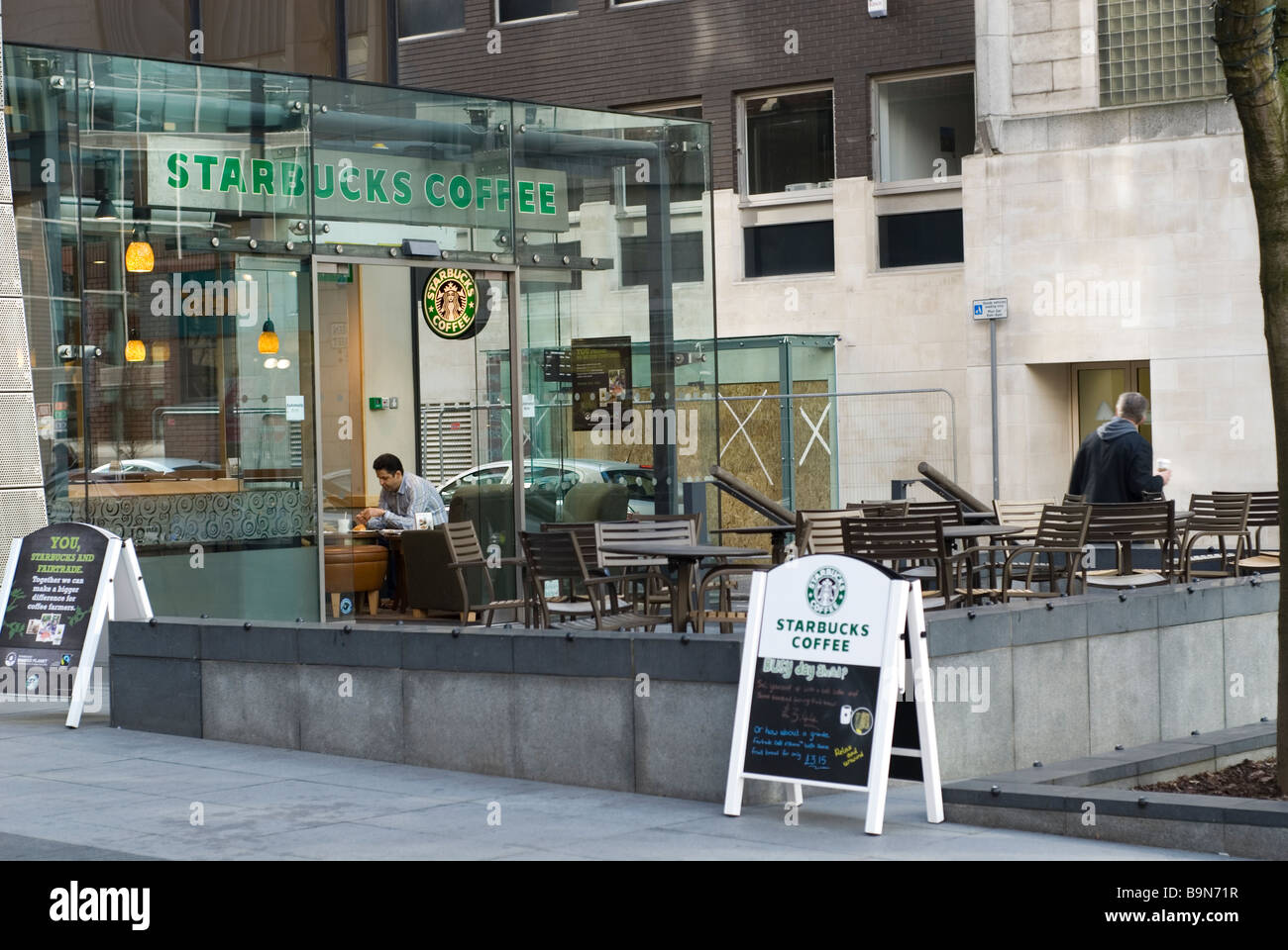 Starbucks Coffee store exteriors in Manchester city centre UK Stock Photo