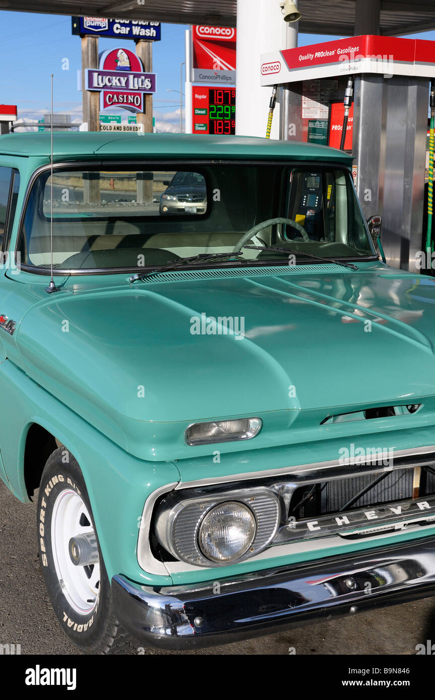 1962 restored Chevrolet C10 truck at a gas station in Corwin Springs Montana USA Stock Photo
