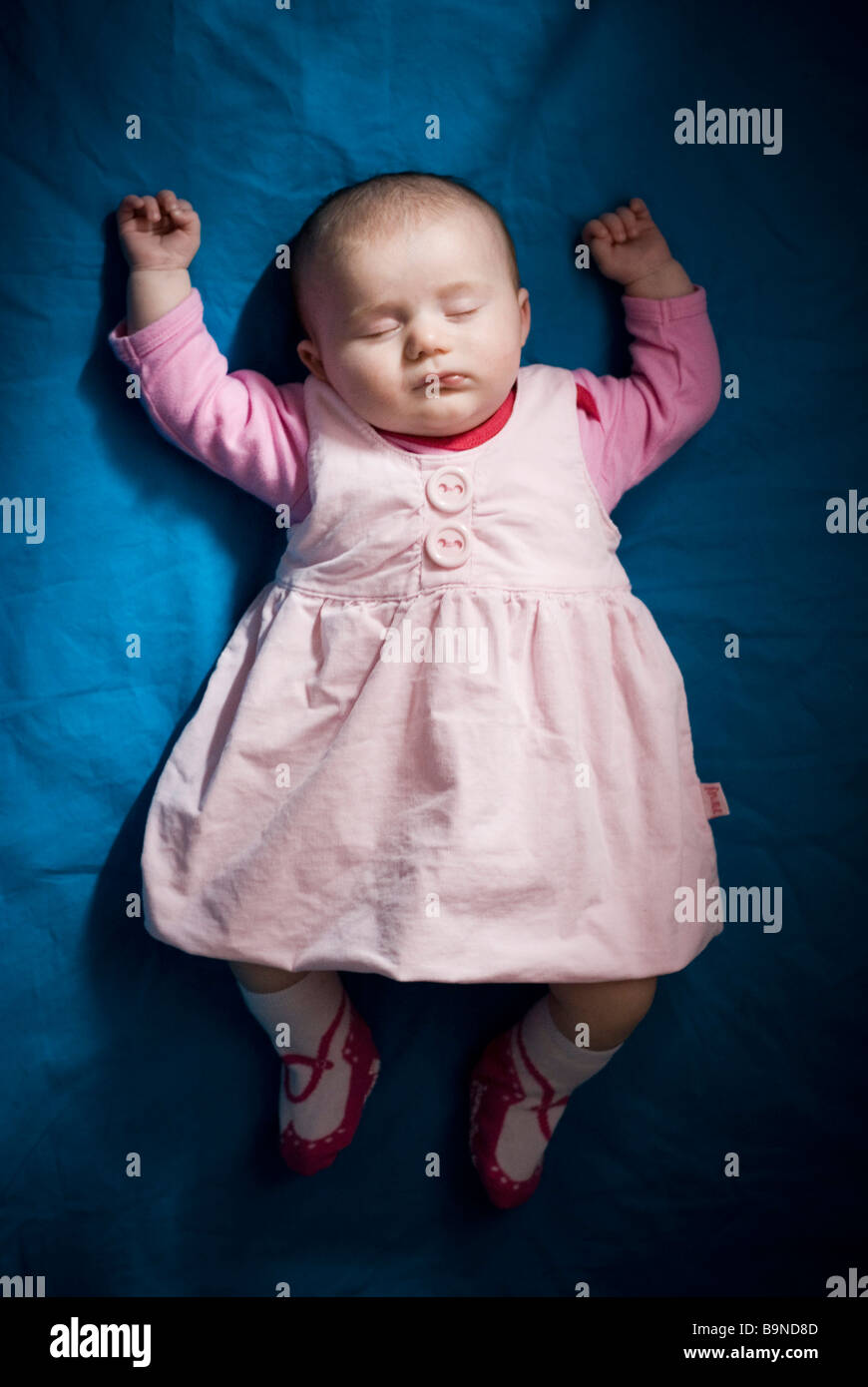 Baby sleeping on back in cot hi-res stock photography and images - Alamy
