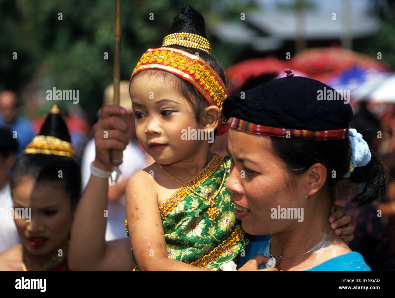 Young girl taking part in the children's beauty pageant, Phimai festival, Buddhist New Year, Luang Prabang, Laos. Stock Photo