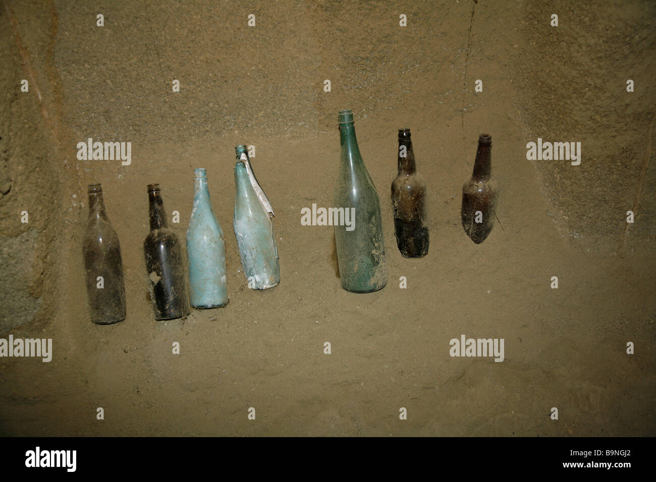 Japanese Saki bottles inside one of the caves used by the Japanese Army during the battle for Iwo Jima in 1945 Stock Photo