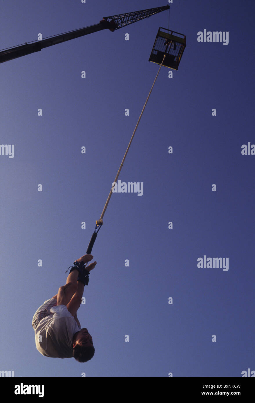 New York City, NY Bungee Jumper leaps from a cage 150 feet above the Hudson River Stock Photo