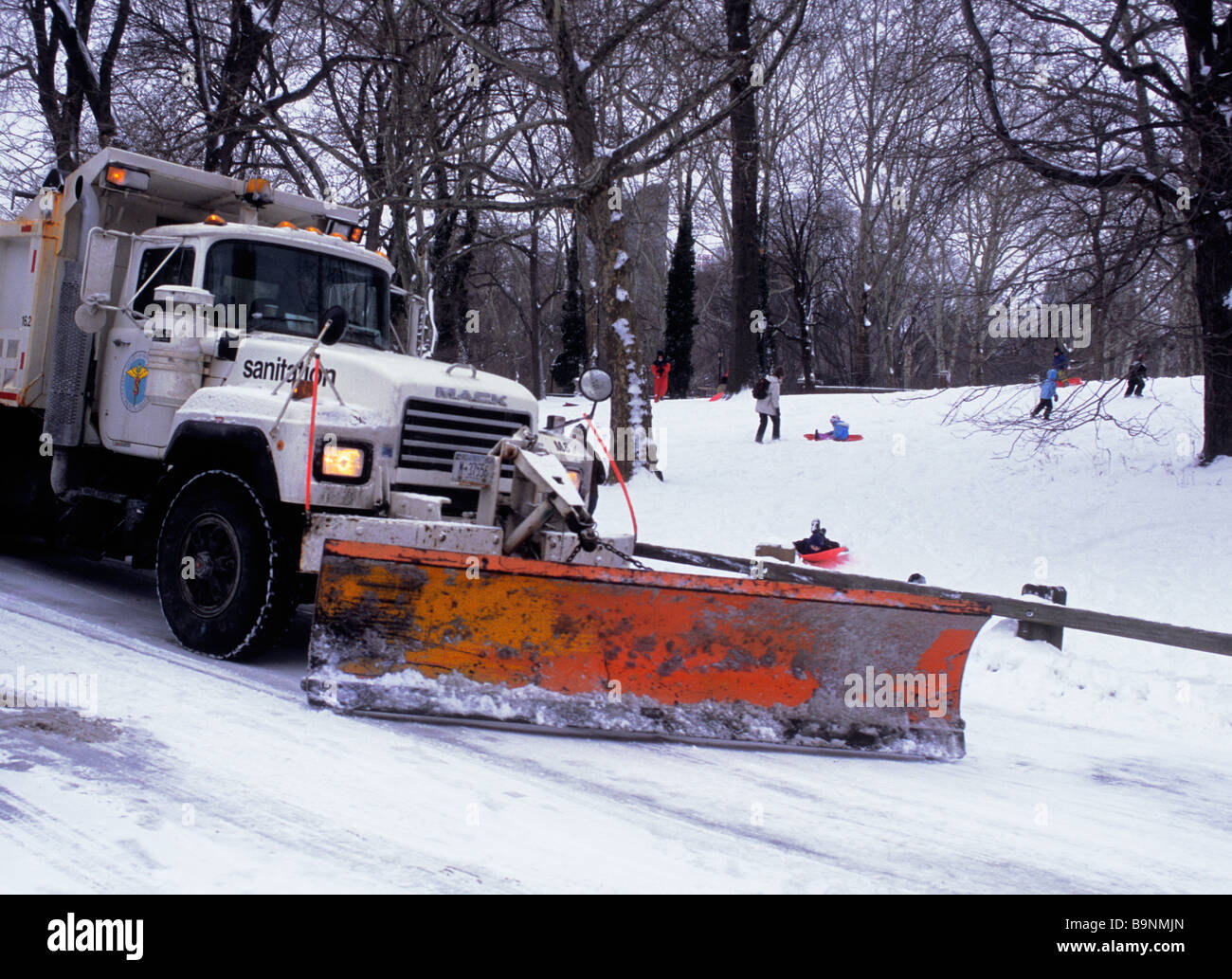 Snow plow in Central Park New York City. Sanitation Department road