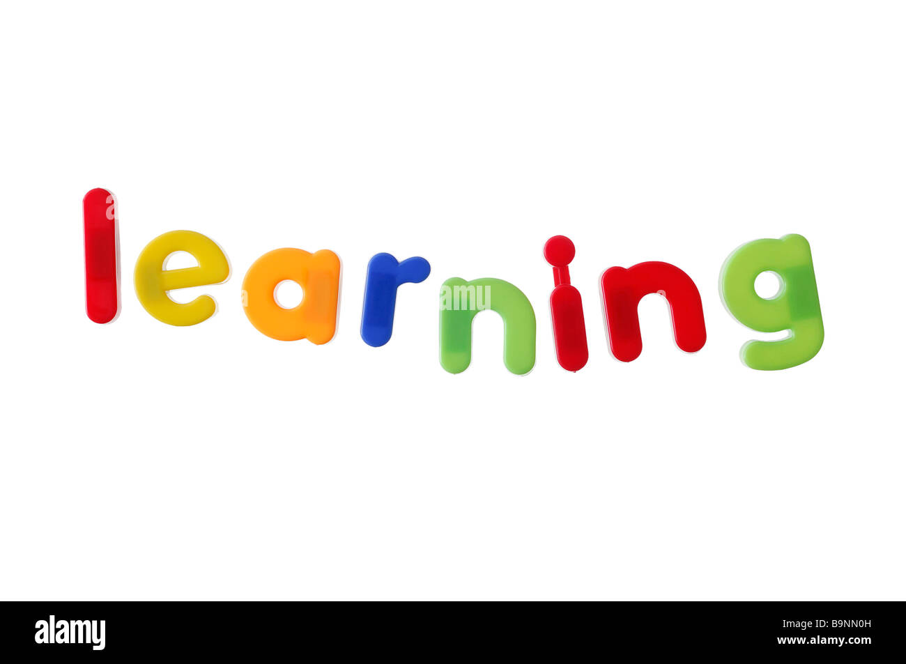 Learning Written with Magnetic Letters Stock Photo