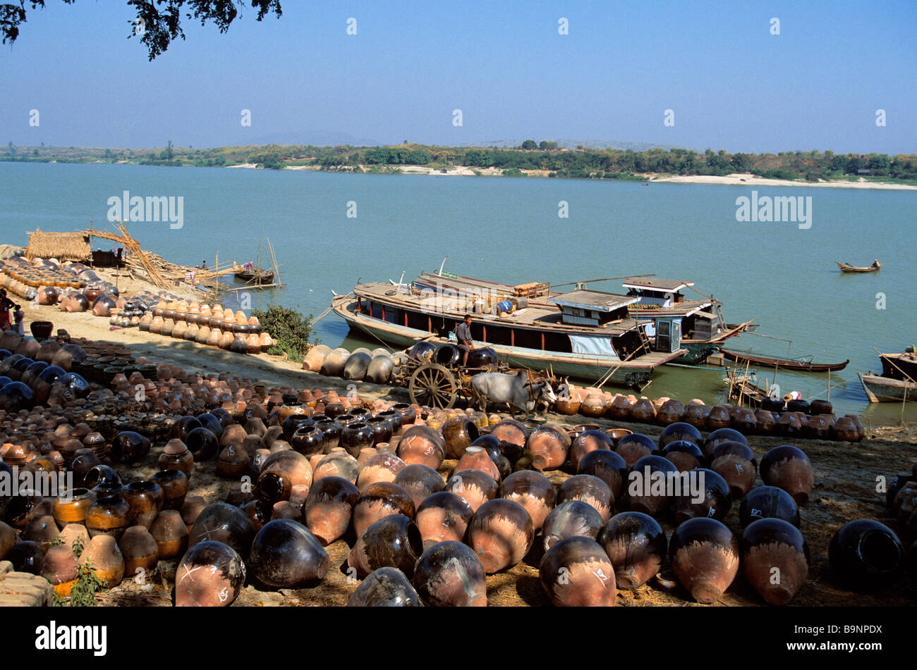 Myanmar (Burma), boat full of potteries on Irrawaddy River, essential for Burmese people's daily life Stock Photo