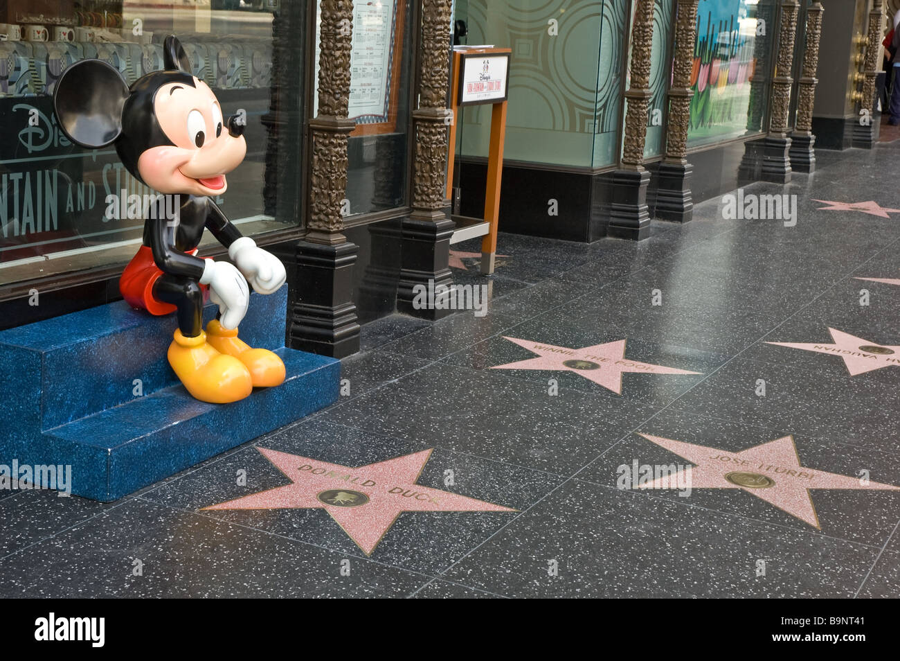 A plastic statue of Micky Mouse outside a souvenir shop lining the Hollywood Walk of Fame on Hollywood Blvd. Stock Photo