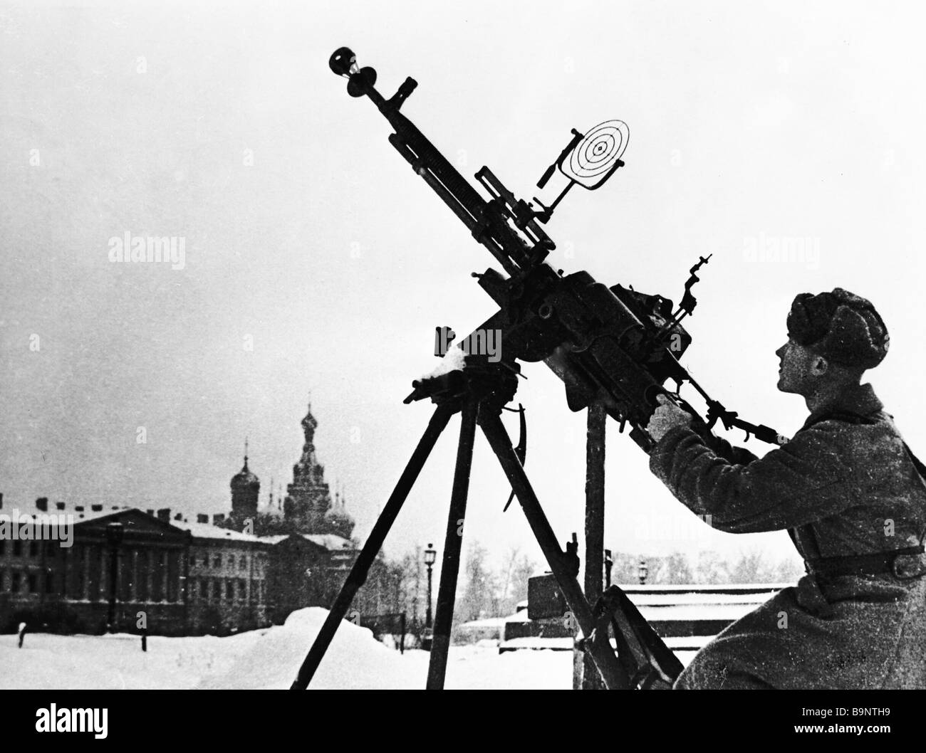Red Army soldier and anti aircraft machine gun at a firing position