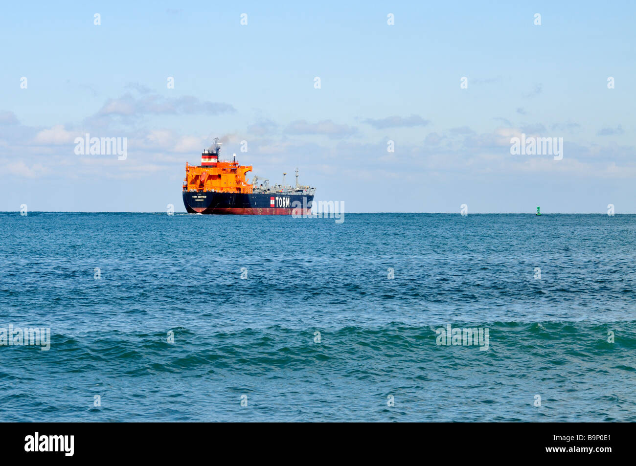 'Oil tanker' ship the 'Torm Gertrud' heading out to sea alone Stock Photo