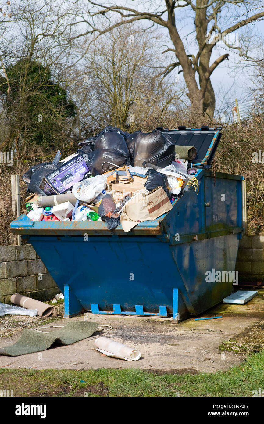 Overloaded Waste Skip Stock Photo - Alamy