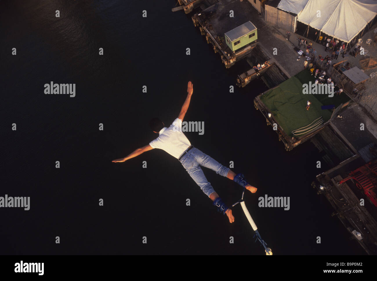 New York, NY Bungee jumper leaps 150 feet over the Hudson River in Lower Manhattan Stock Photo