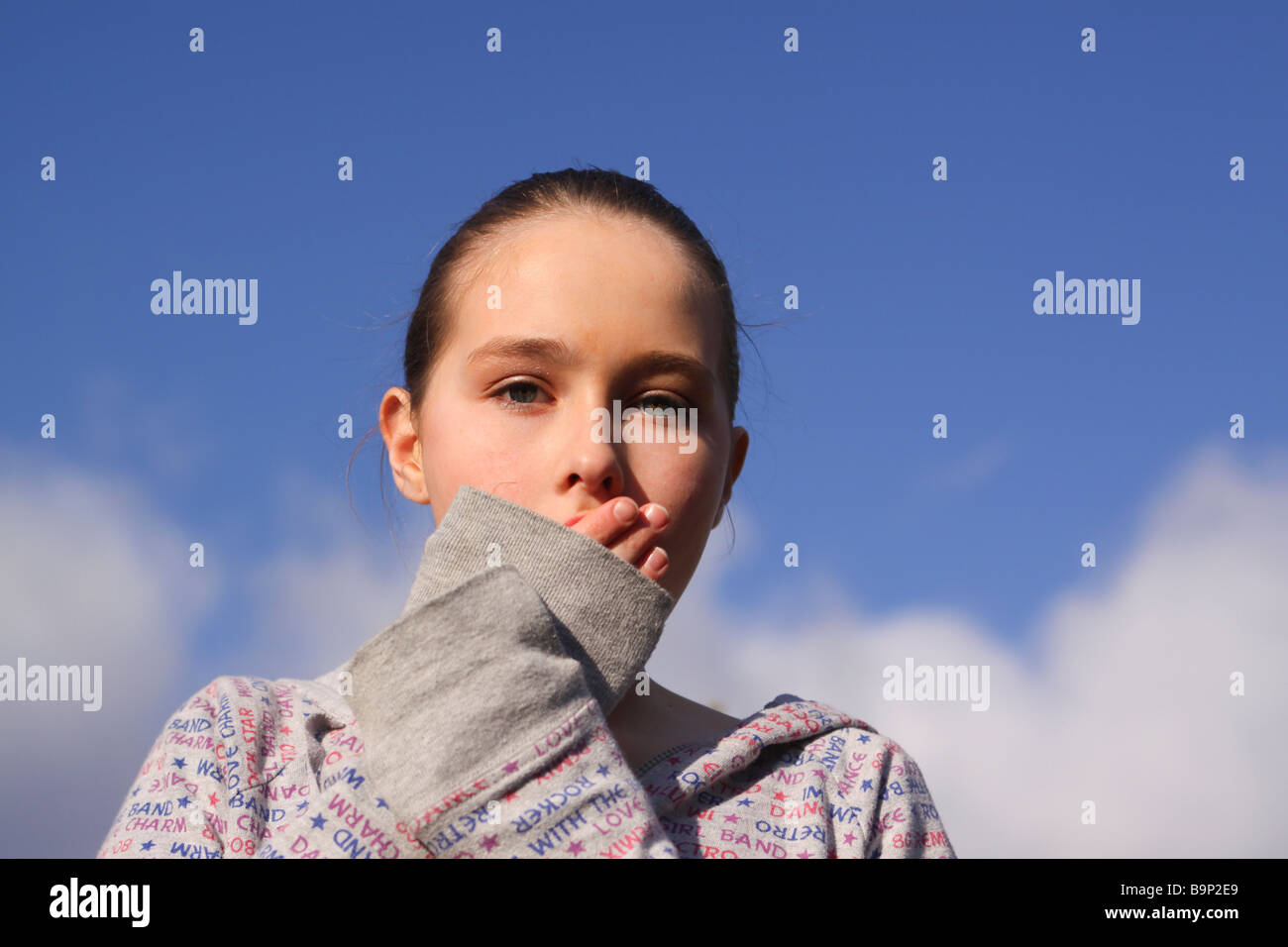Young girl faking shocked look Stock Photo Alamy