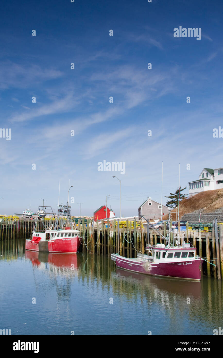 Fishing boats docked at the wharf - Hall's Harbour, Nova Scotia, Canada. Stock Photo