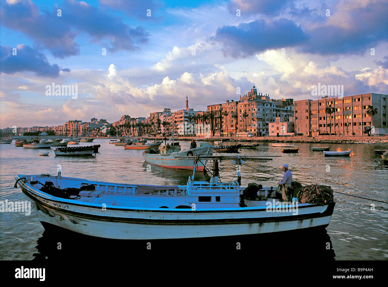 Egypt, Alexandria, fishing boats returning at dawn Stock Photo