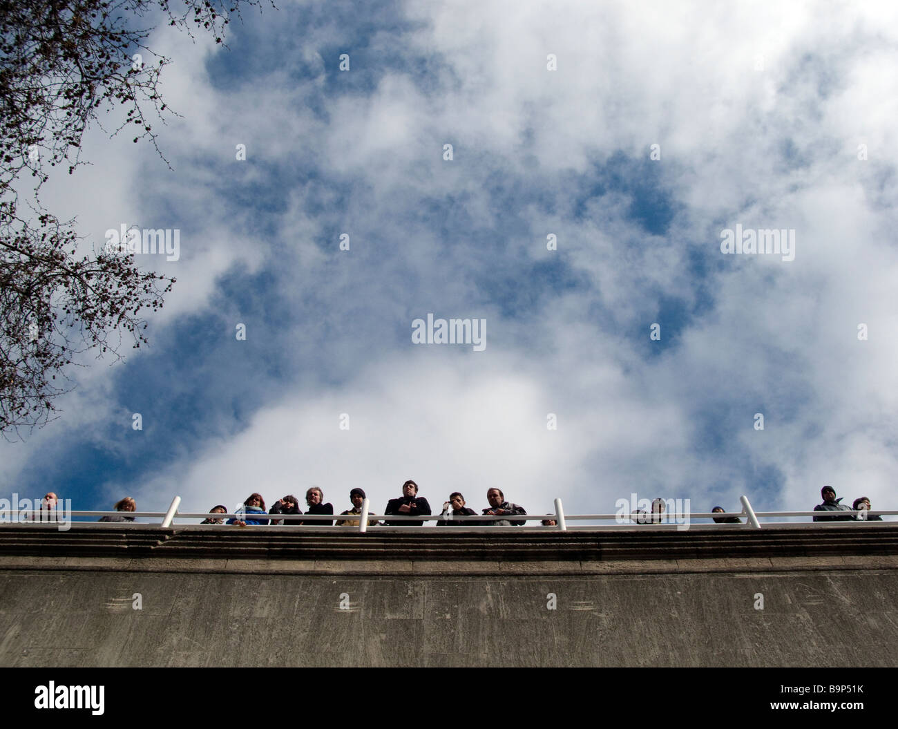 Crowd of people looking over Waterloo Bridge, London Stock Photo Alamy