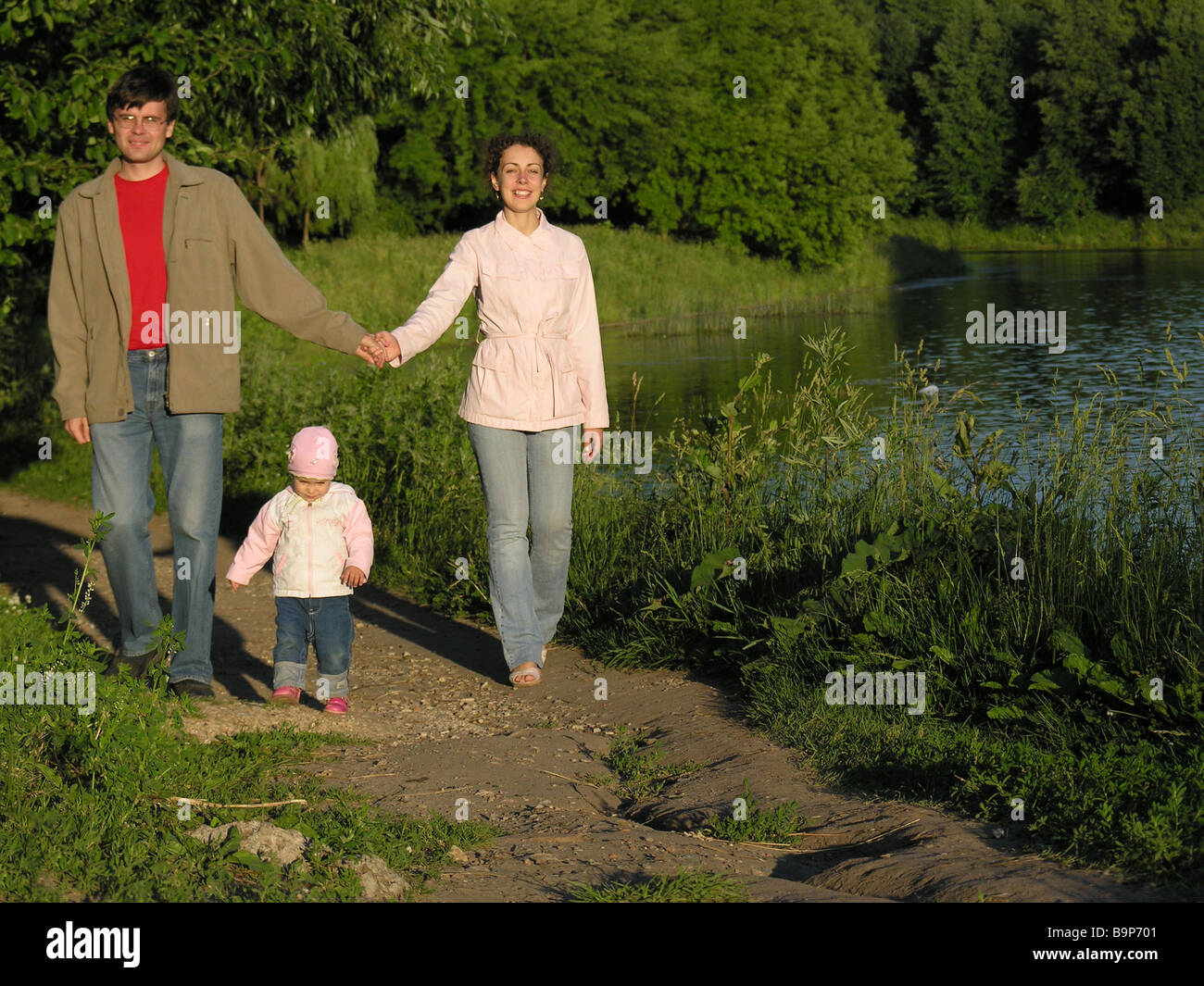 family in park Stock Photo - Alamy