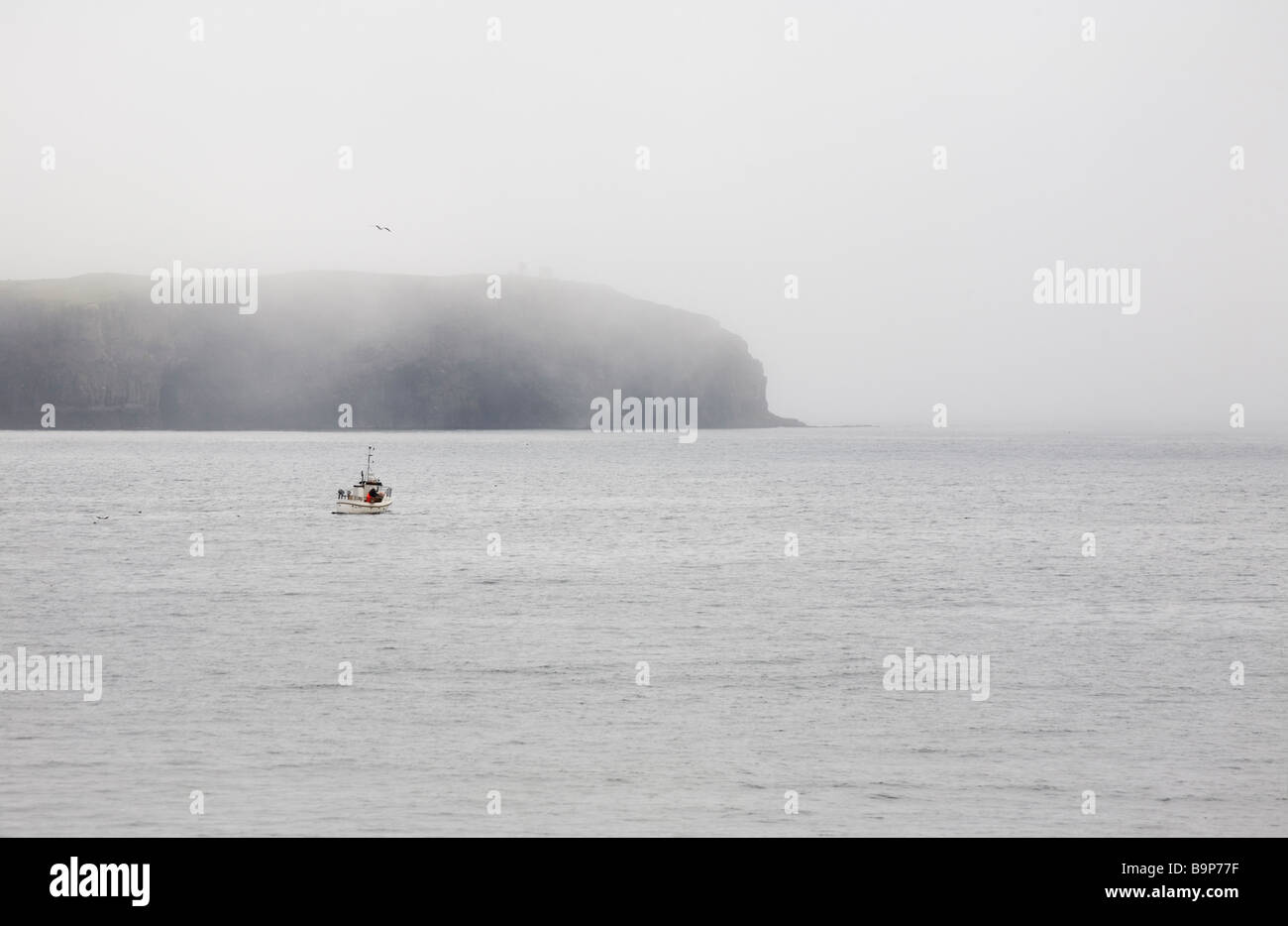 Fishigboat Faroe Islands Mist Fog Nordic countries Stock Photo