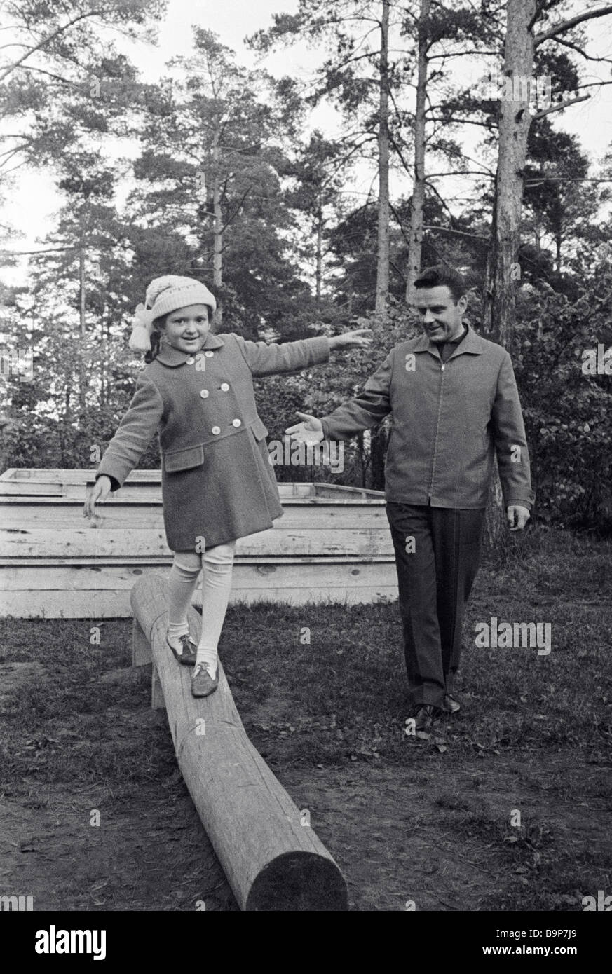 Cosmonaut Vladimir Komarov and his daughter Irina in a park 1965 Stock ...