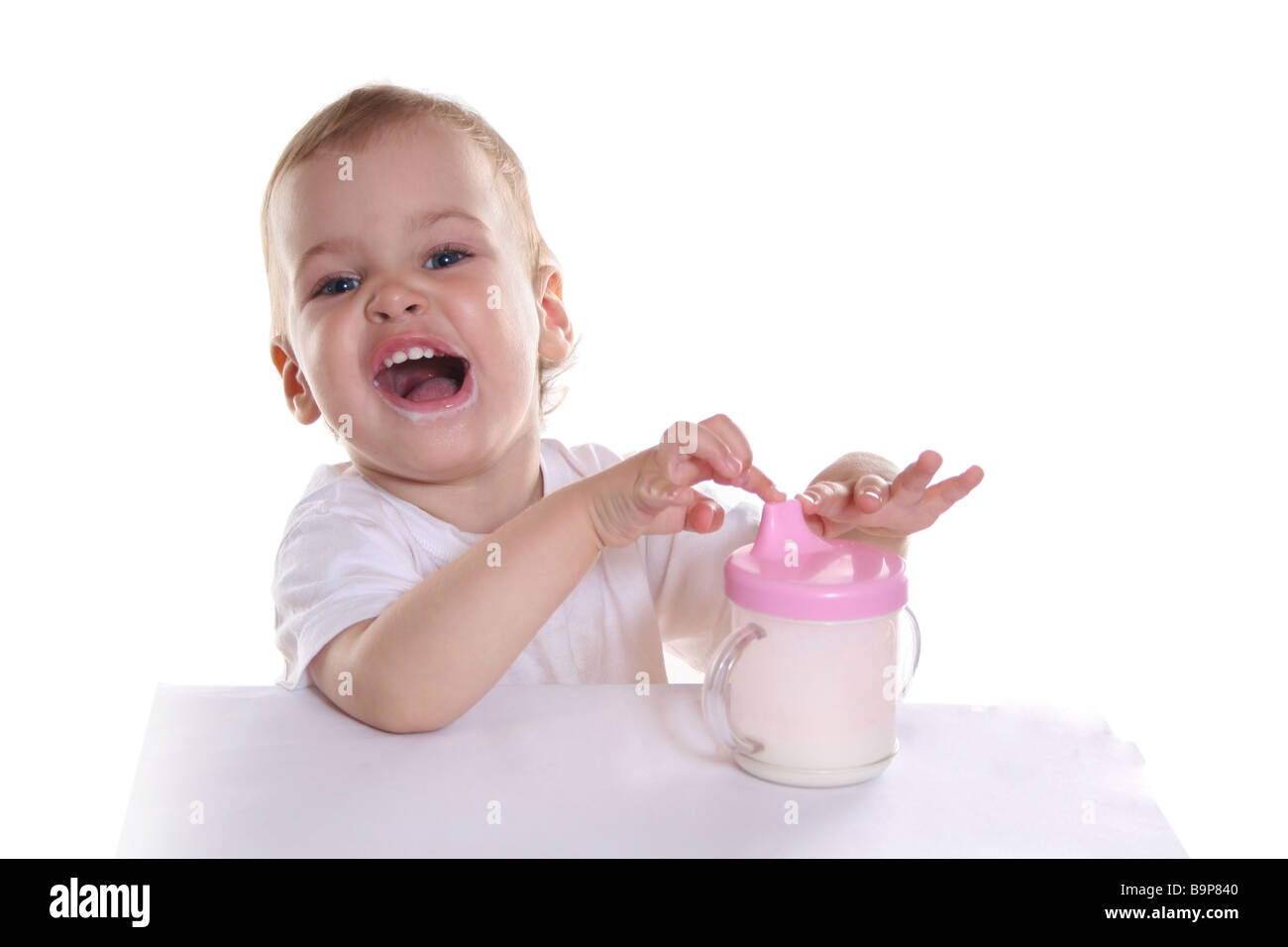 happy baby with milk Stock Photo - Alamy