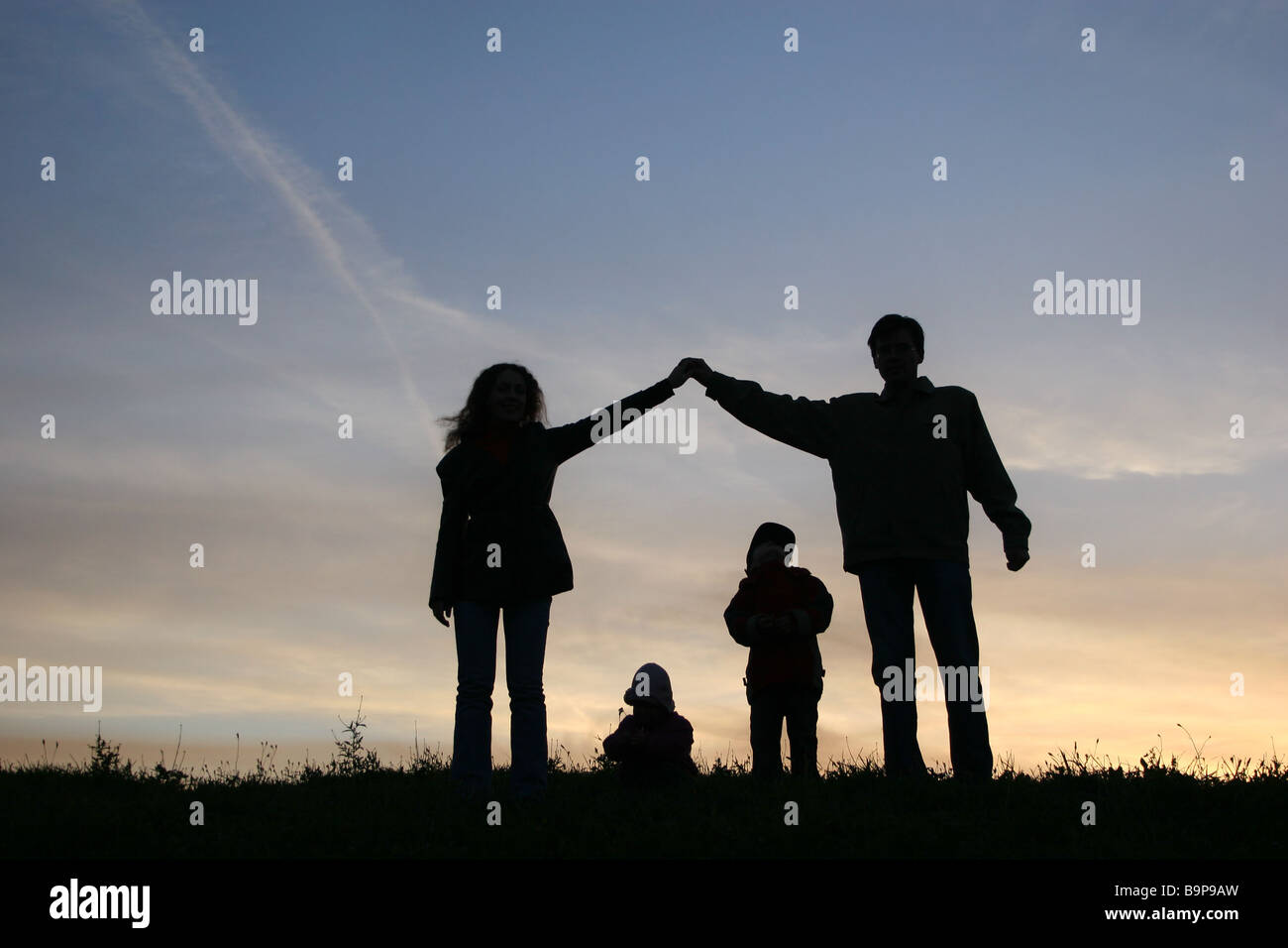 silhouette family house Stock Photo - Alamy