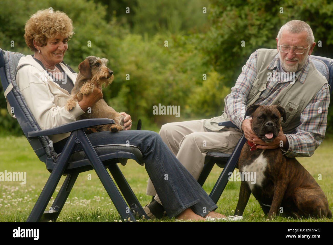 Seniors and Dog Stock Photo