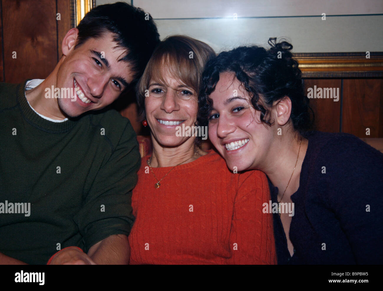 Mother with her college age son and daughter. Stock Photo