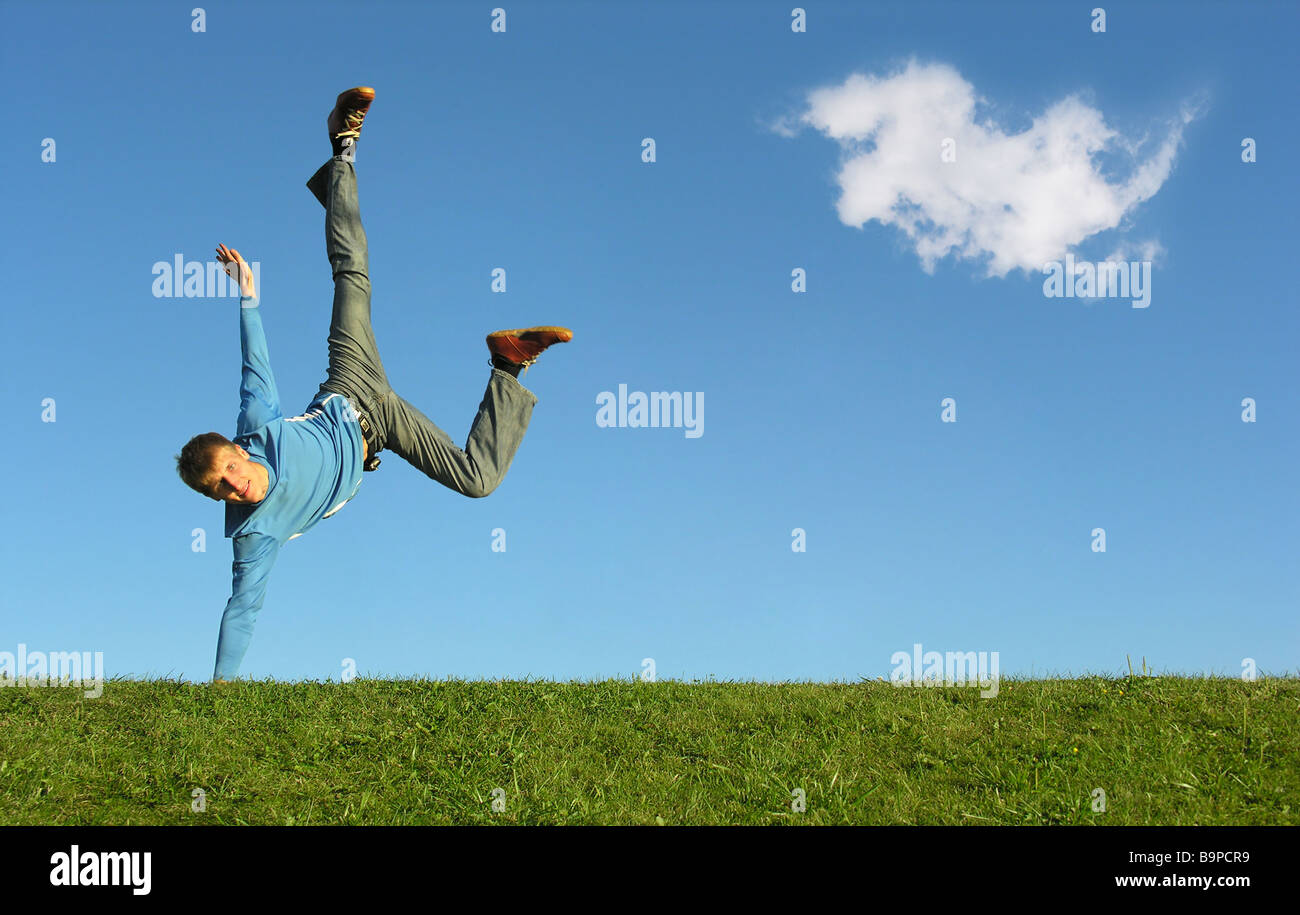 man on hand on blue sky with cloud Stock Photo - Alamy