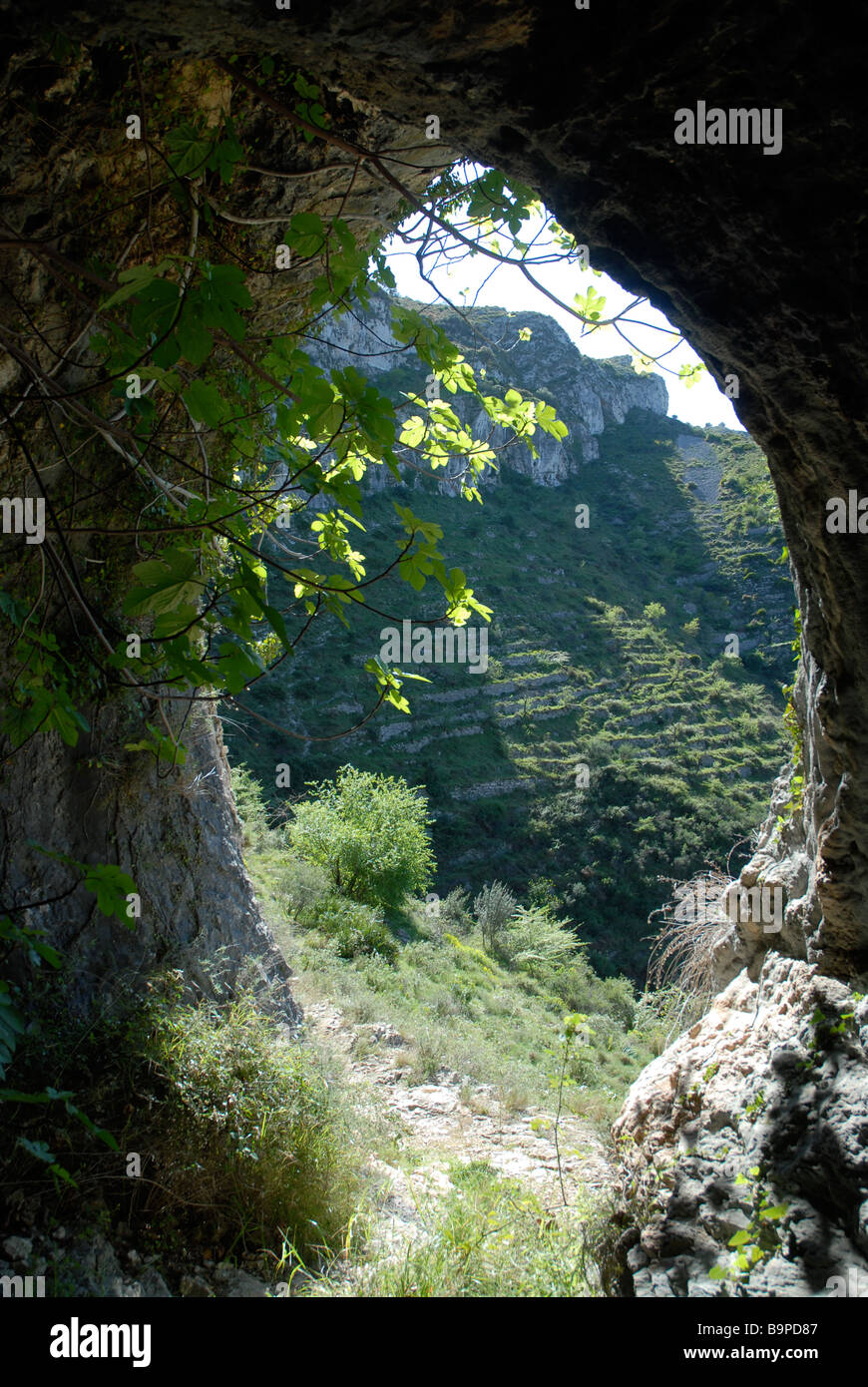 cave entrance off Mozarabic trail, Vall de Laguart, Benimaurell, Alicante Province, Comunidad Valenciana, Spain Stock Photo