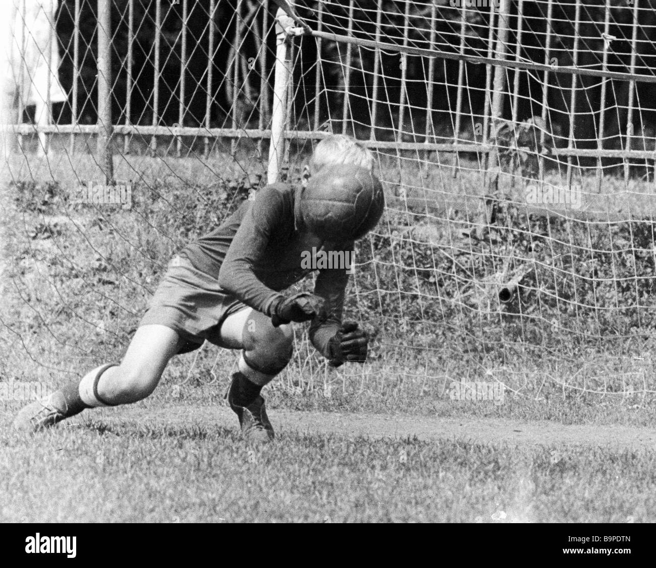 Goal keeper prepares to return ball Stock Photo Alamy
