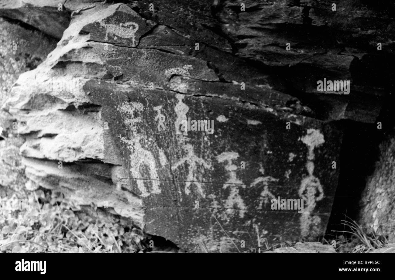 Rock paintings of people Stock Photo - Alamy