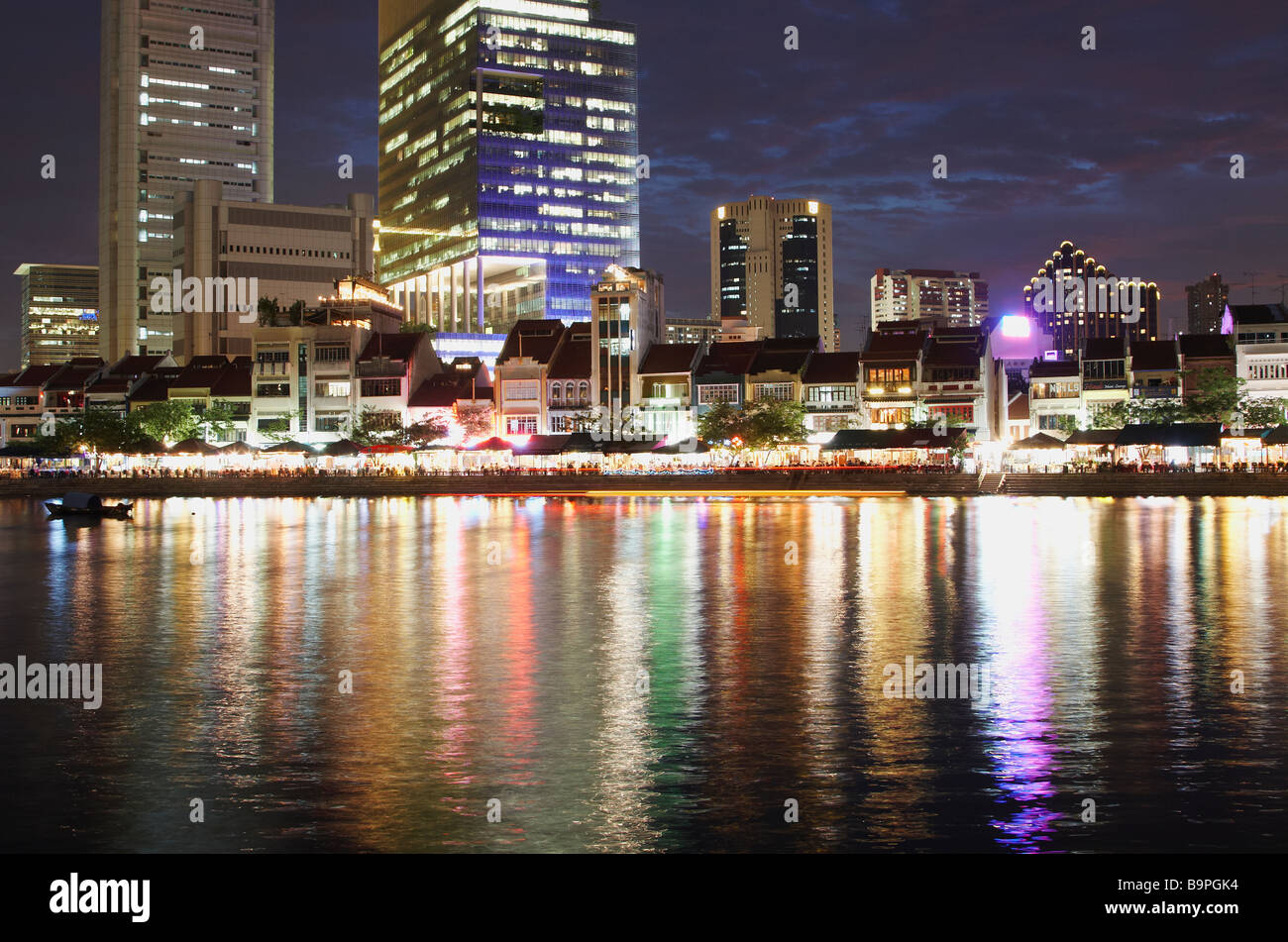 Restaurants Along Singapore River In Central Business District At Dusk Stock Photo
