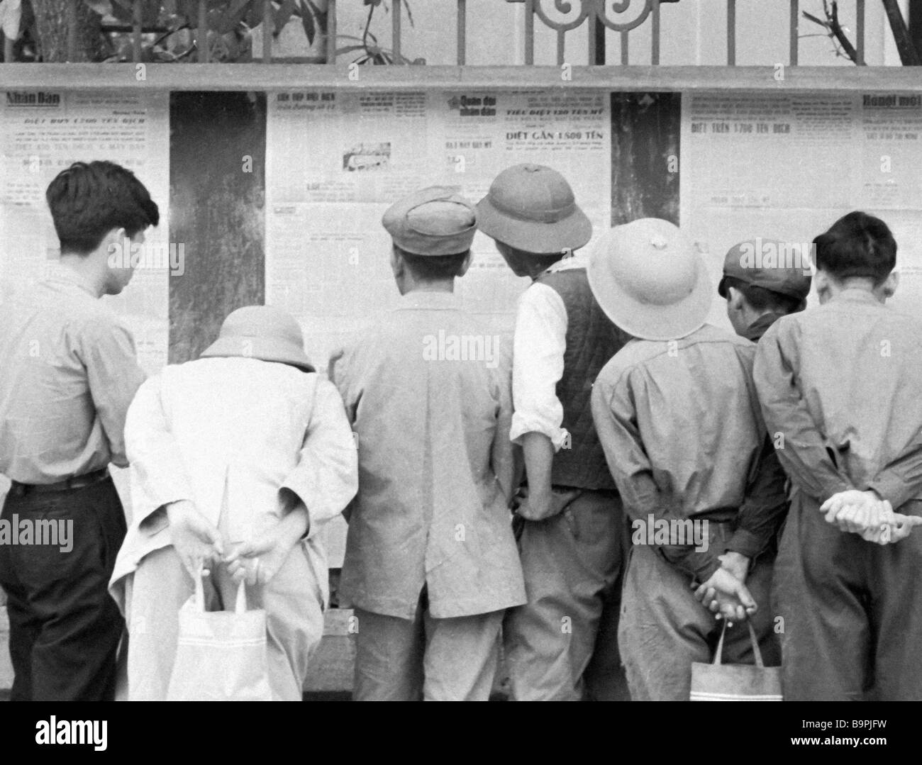 Hanoi residents reading the latest news on the bulletin board Stock Photo Alamy