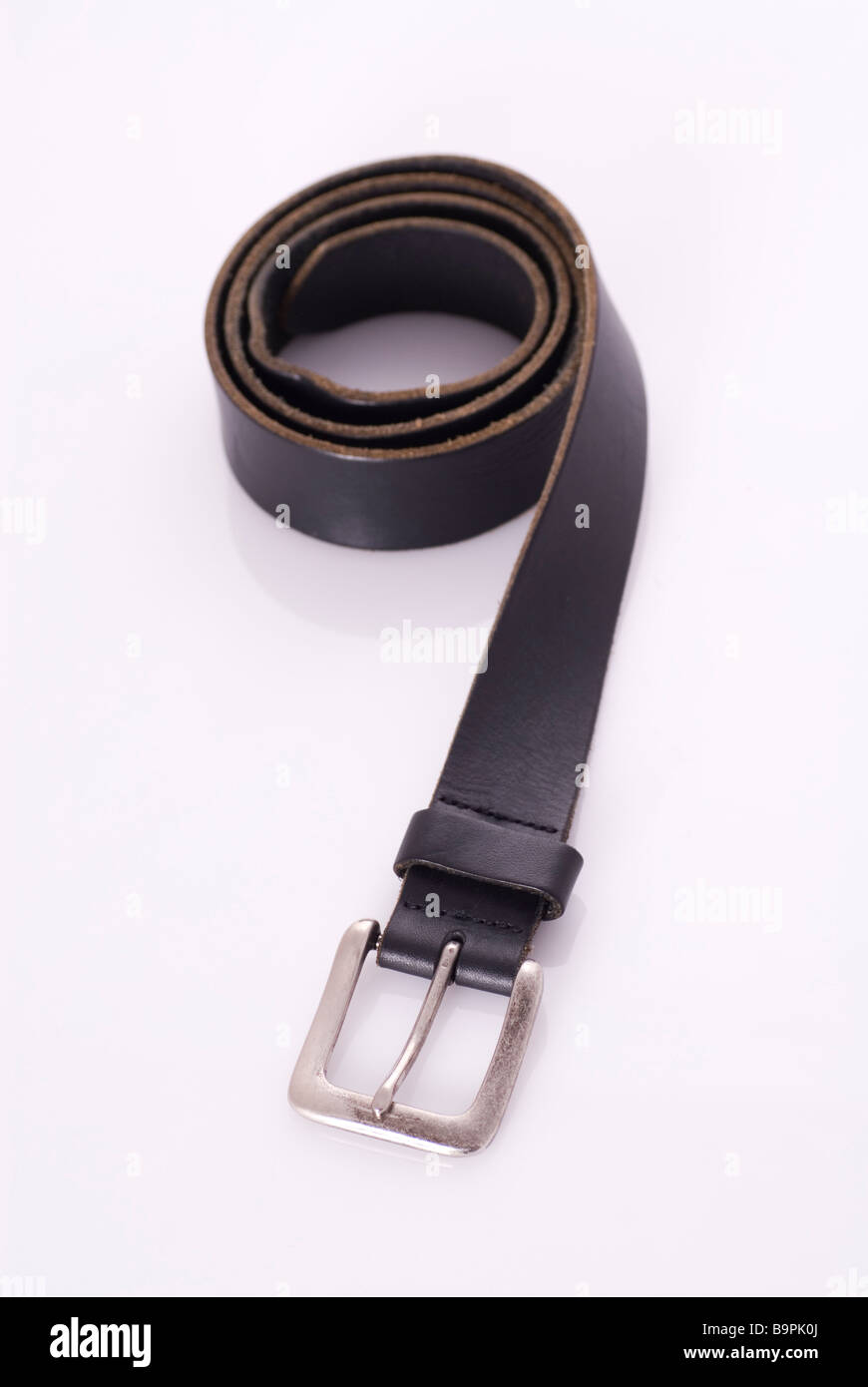 Black leather belt on a white background Stock Photo - Alamy