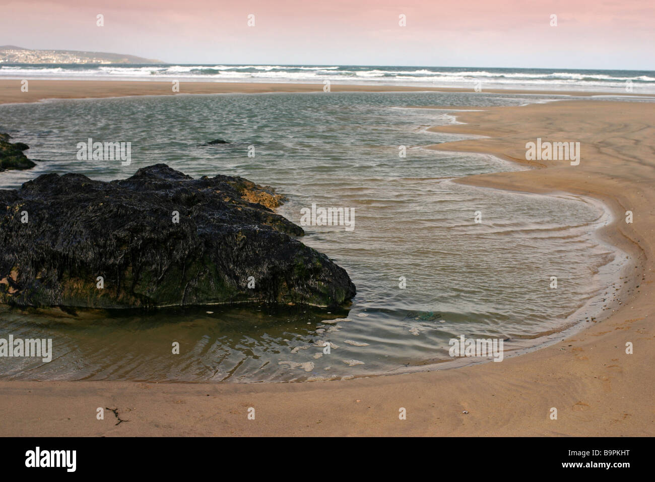 Tide Coming In Tide coming in Hayle Towans Cornwall UK Stock Photo - Alamy