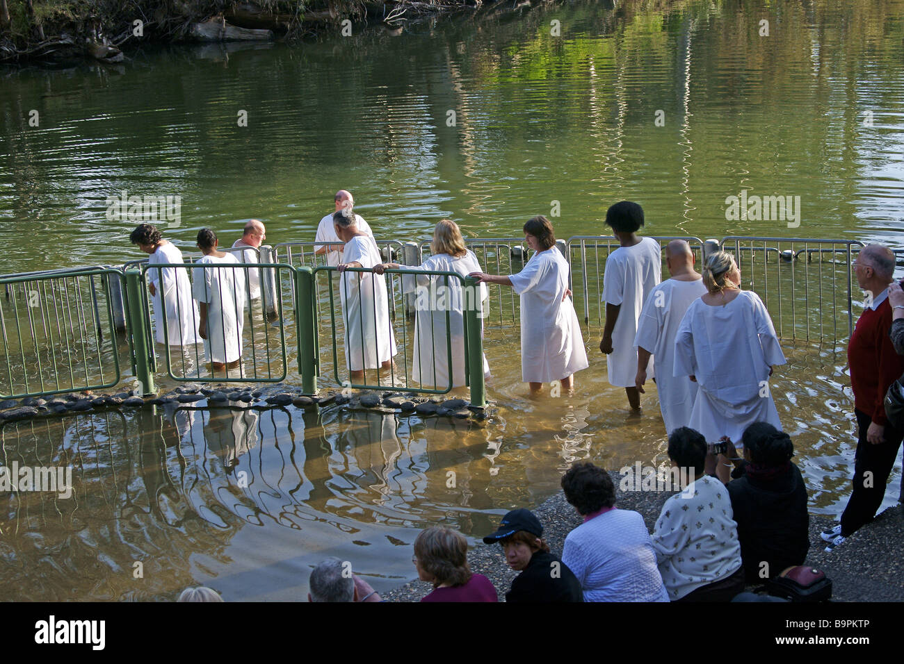 Israel Yardenit Baptismal Site In the Jordan River Near the Sea of Galilee A group of pilgrims