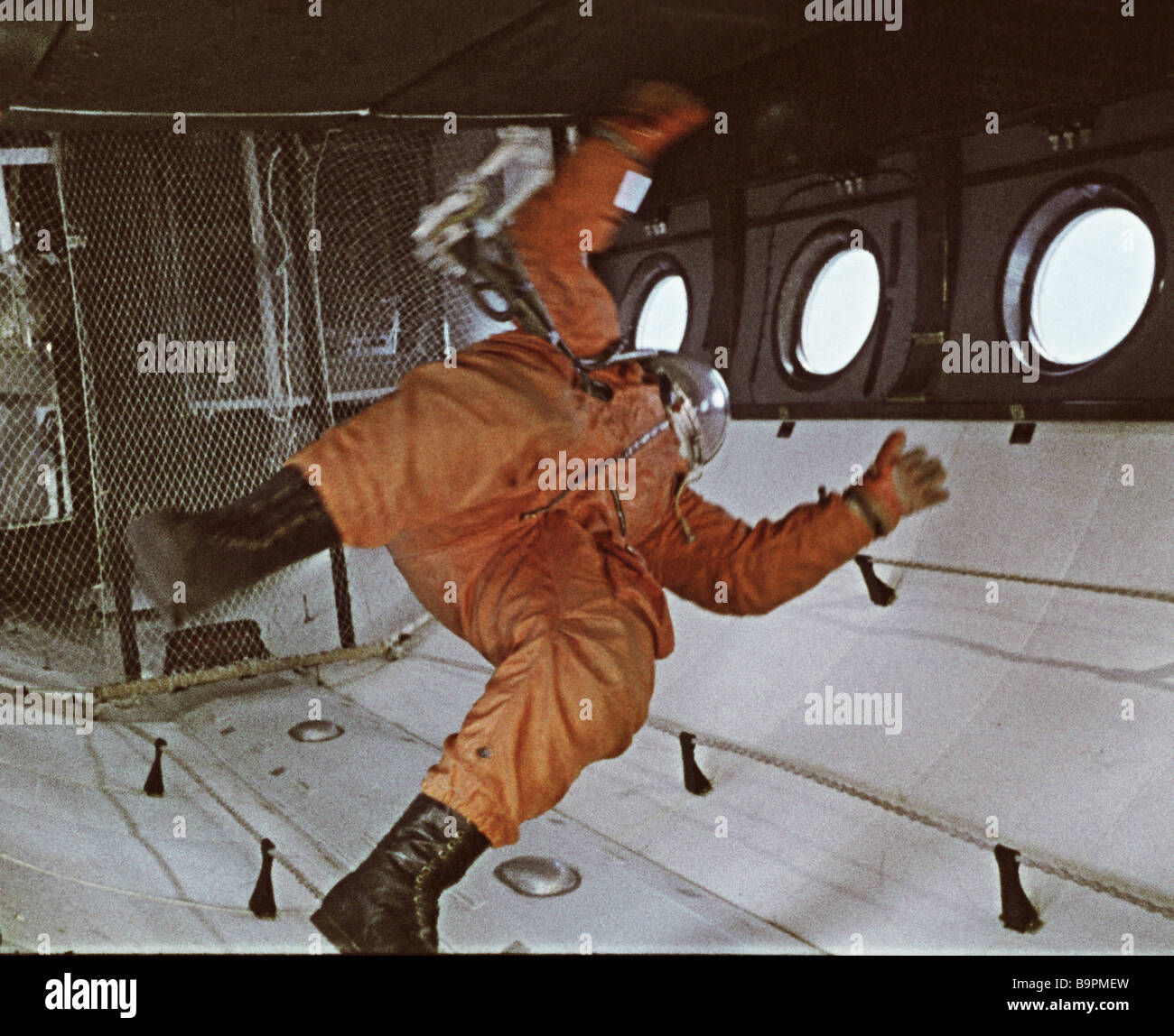 A spaceman training in a zero gravity machine before a flight Stock