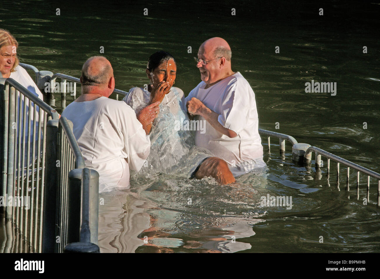 Israel Yardenit Baptismal Site In the Jordan River Near the Sea of Galilee A group of pilgrims