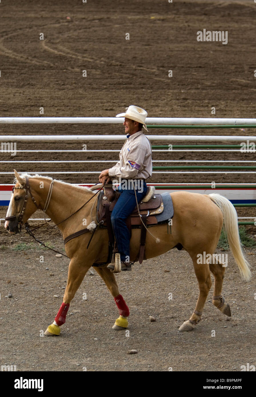 Stetson hat cowboy riding horse Cody Nite Rodeo Wyoming USA Stock Photo Alamy