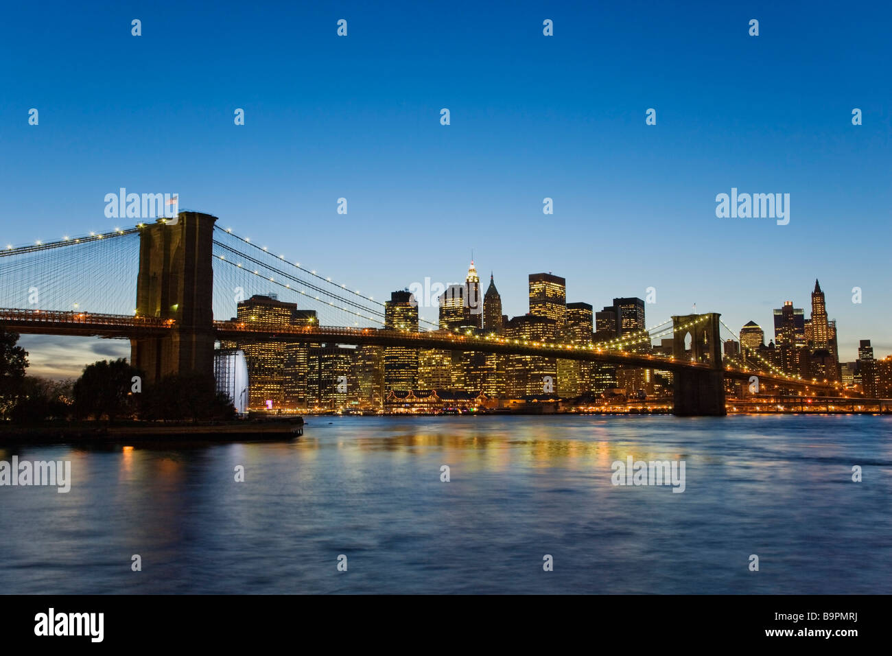Brooklyn and manhattan bridges over the east river at night hi-res ...