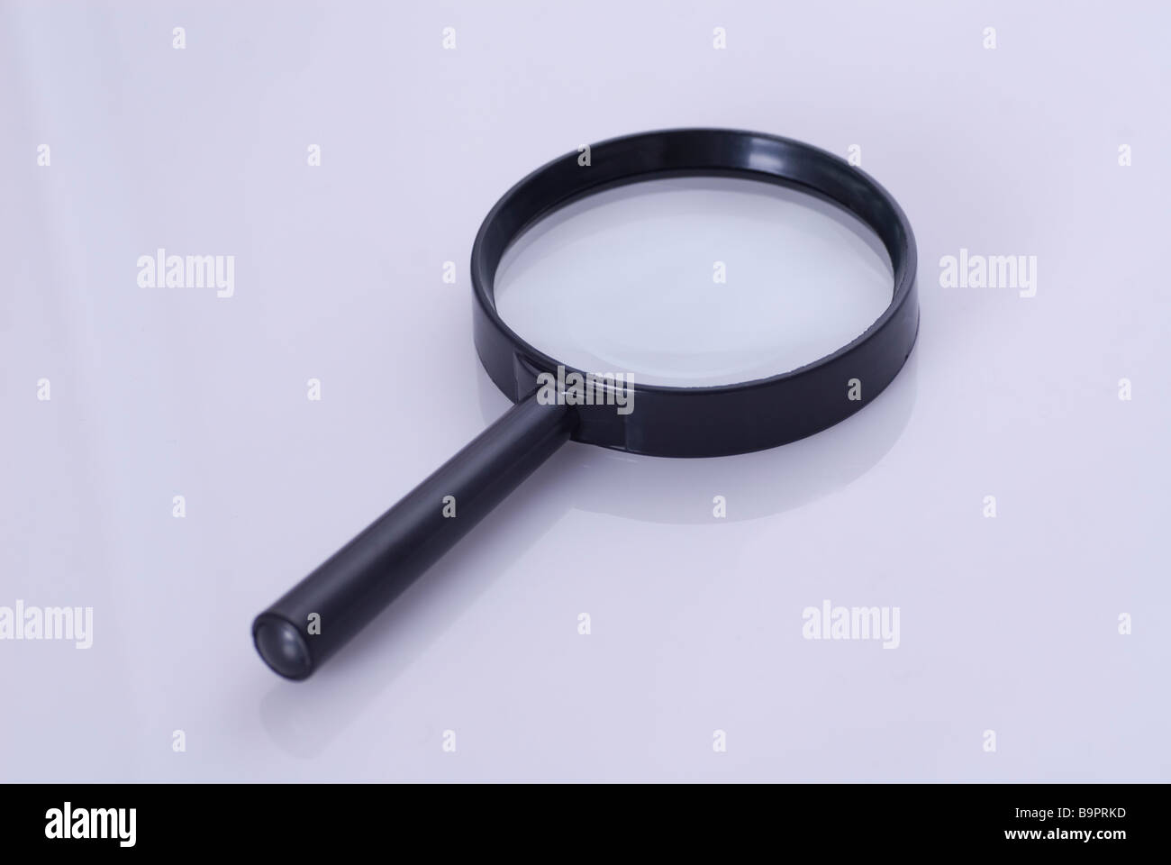 Magnifying glass on a white background Stock Photo