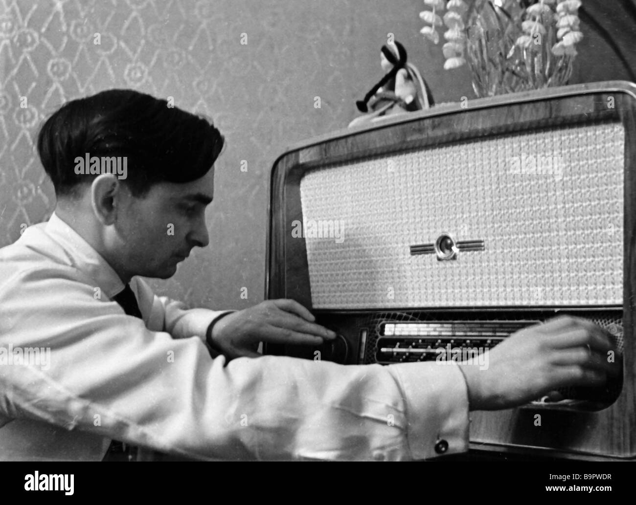 Pilot Cosmonaut Valery Bykovsky listens to radio set Stock Photo Alamy