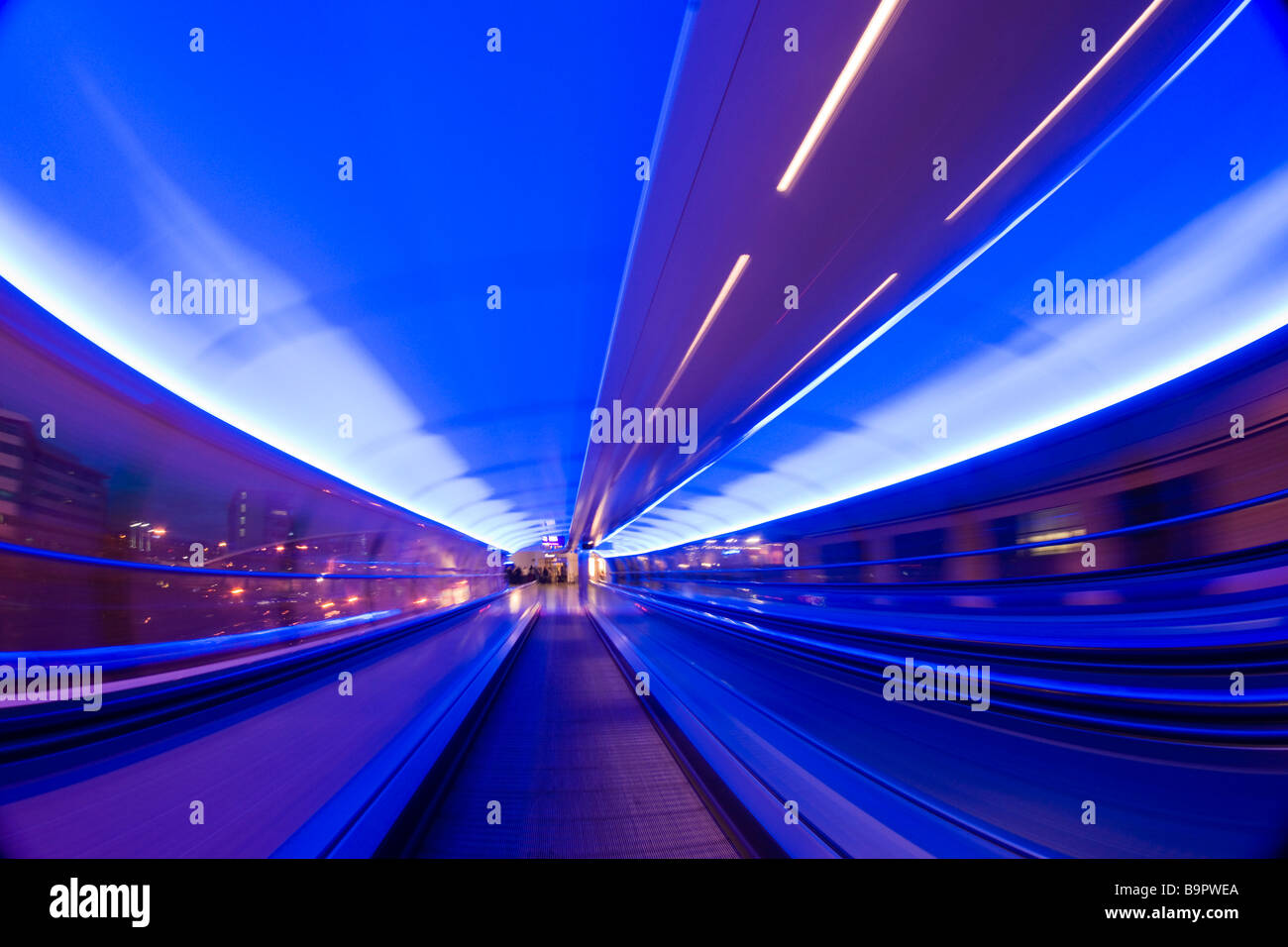 Manchester Airport UK the passenger connection walkways with travelators at night Stock Photo