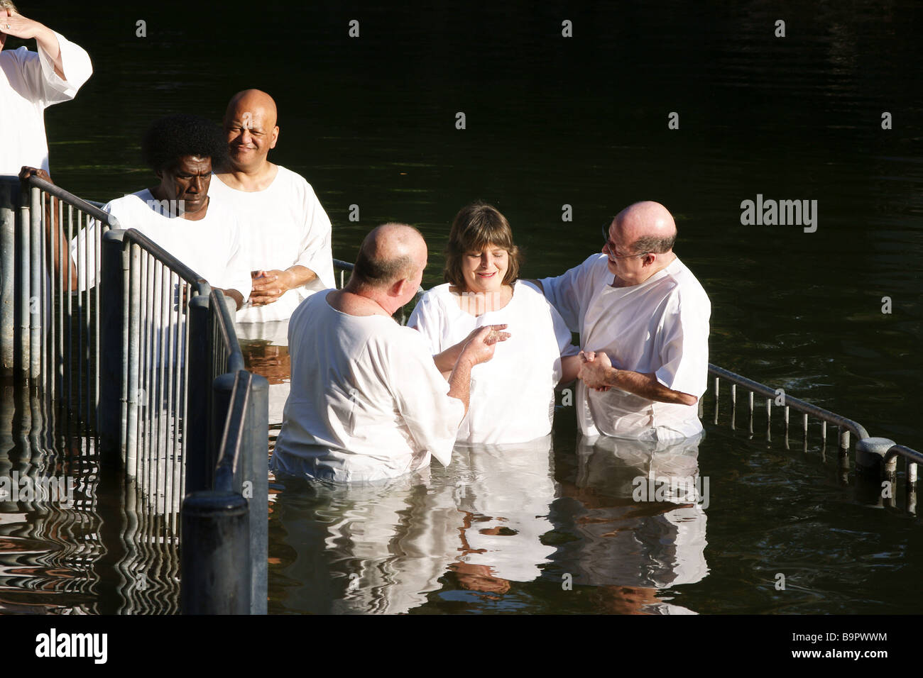 Israel Yardenit Baptismal Site In the Jordan River Near the Sea of Galilee A group of pilgrims