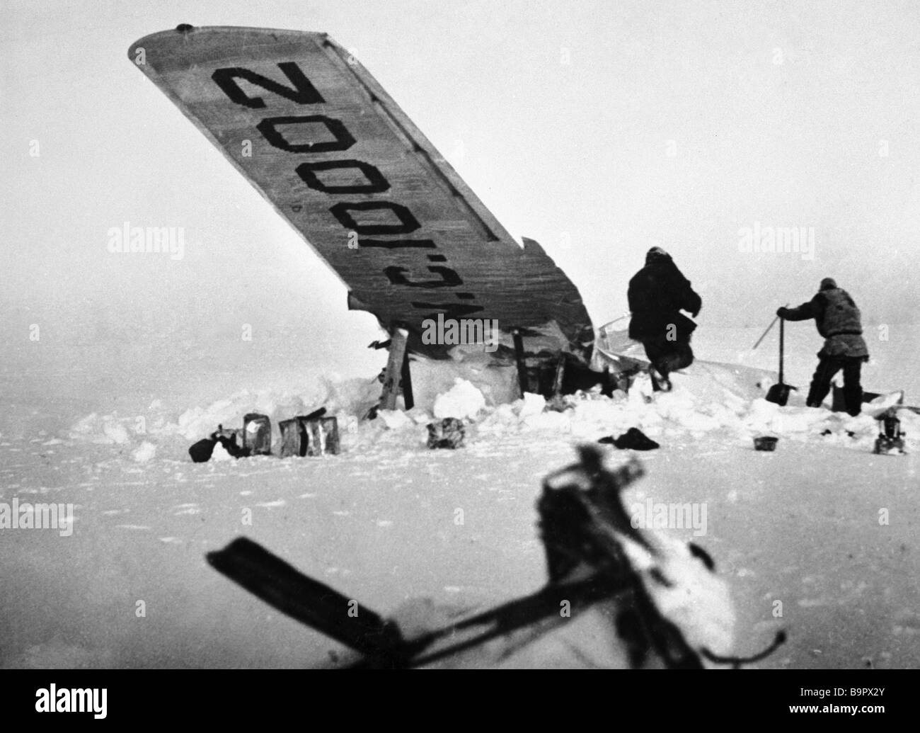 Rescuers on the site of Carl Ben Eielson s air crash site in the