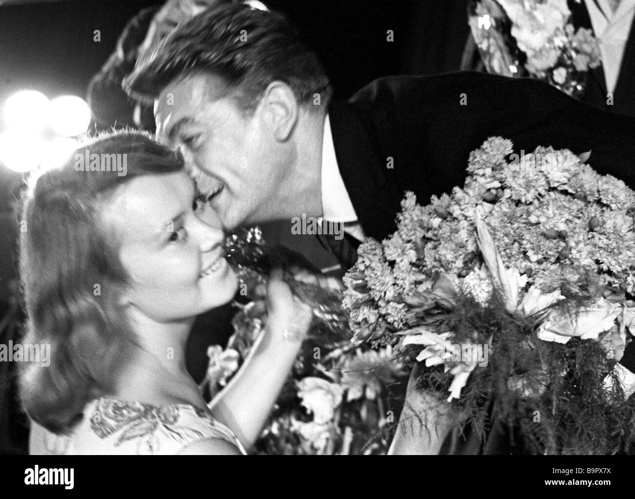 French film star Jean Marais kisses a Moscow fan during the 3rd Moscow  International Film Festival in 1963 Stock Photo - Alamy