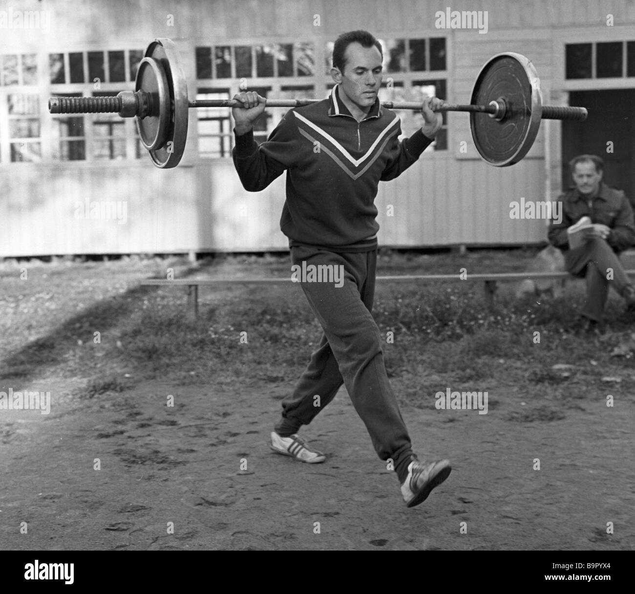 World high jump record holder Valery Brumel training with a weight